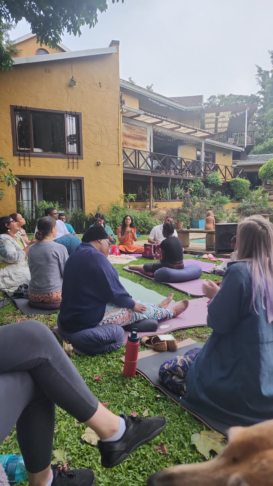 Sacred ritual space with ceremonial setup and participants